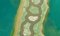 Creation of  a vast wetland zone, which is also a separating zone from a field with drinkable water resources